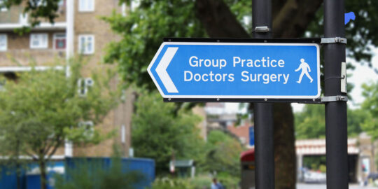 Street sign for Doctors Surgery - NHS clinical waste services GPs